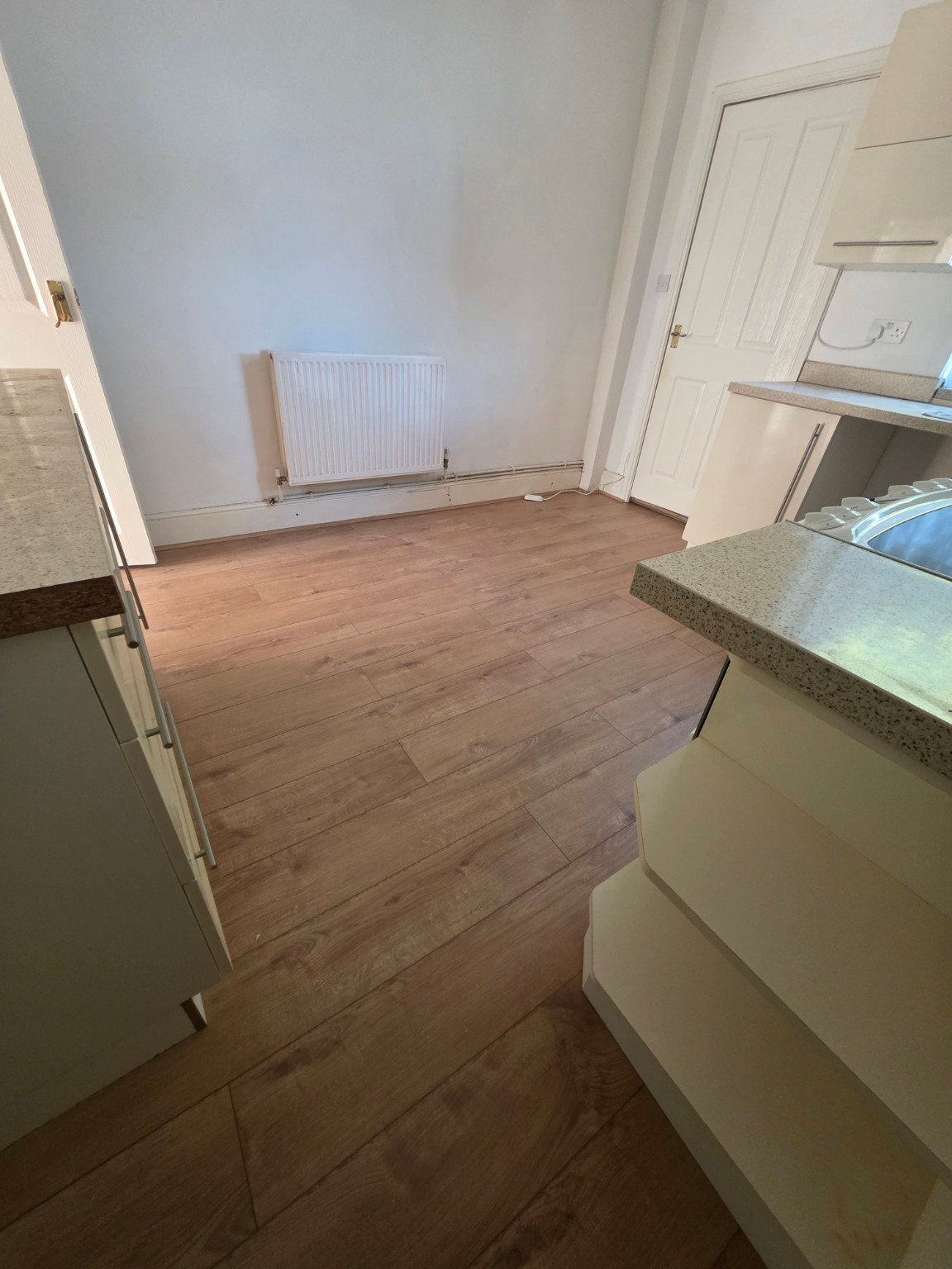 Completed oak-effect laminate flooring installation