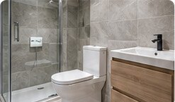 Bathroom suite and tiled shower area
