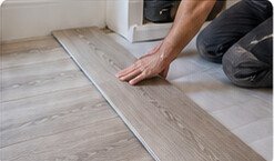 Laminate flooring being installed