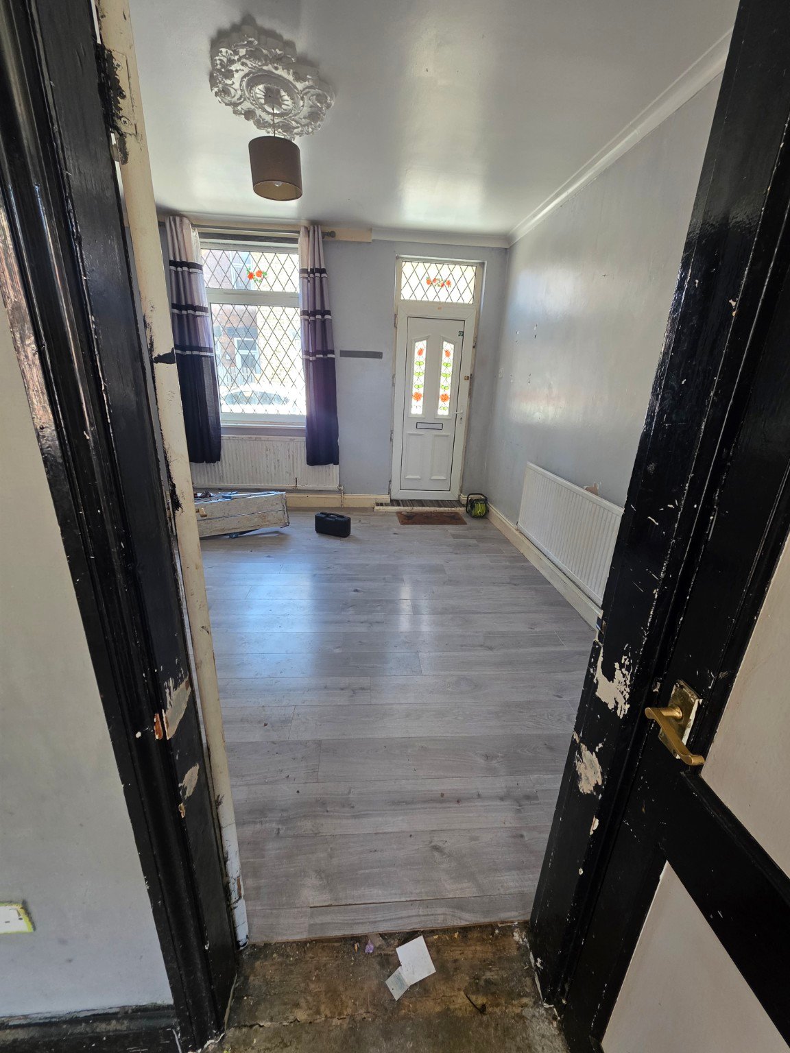 Before - SPC Flooring Installation – Kitchen & Living Room project photo