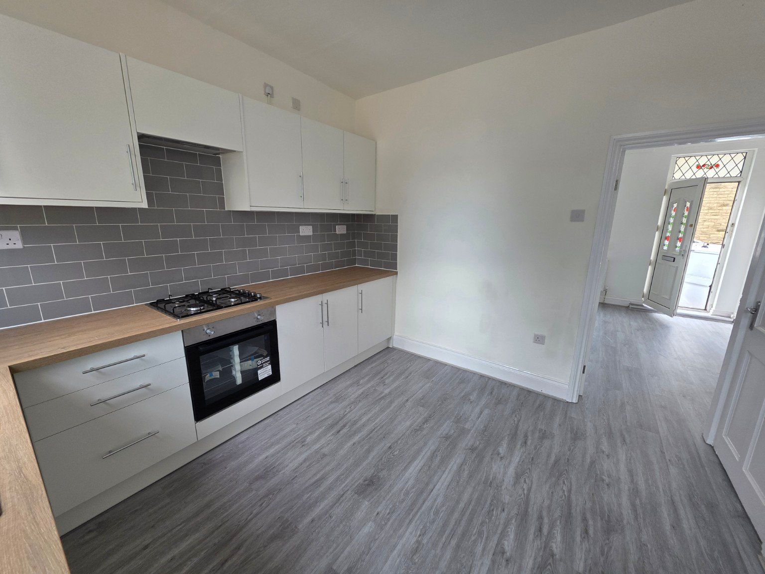After - SPC Flooring Installation – Kitchen & Living Room project photo