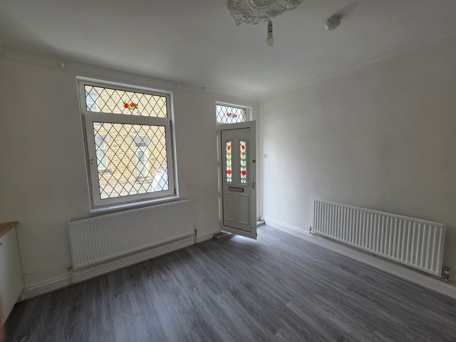 After - SPC Flooring Installation – Kitchen & Living Room project photo