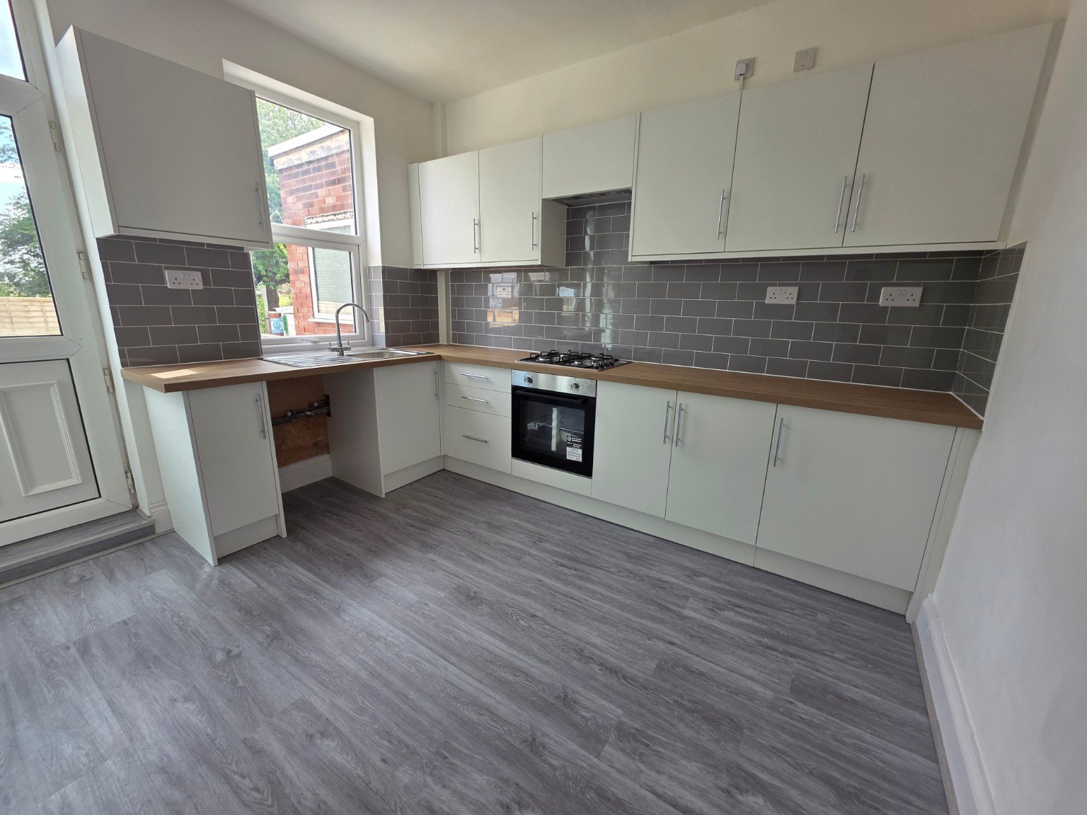 After - SPC Flooring Installation – Kitchen & Living Room project photo